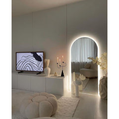 تُضفي المرايا المقوسة الكبيرة المزودة بإضاءة LED لمسة فنية على منزلك.