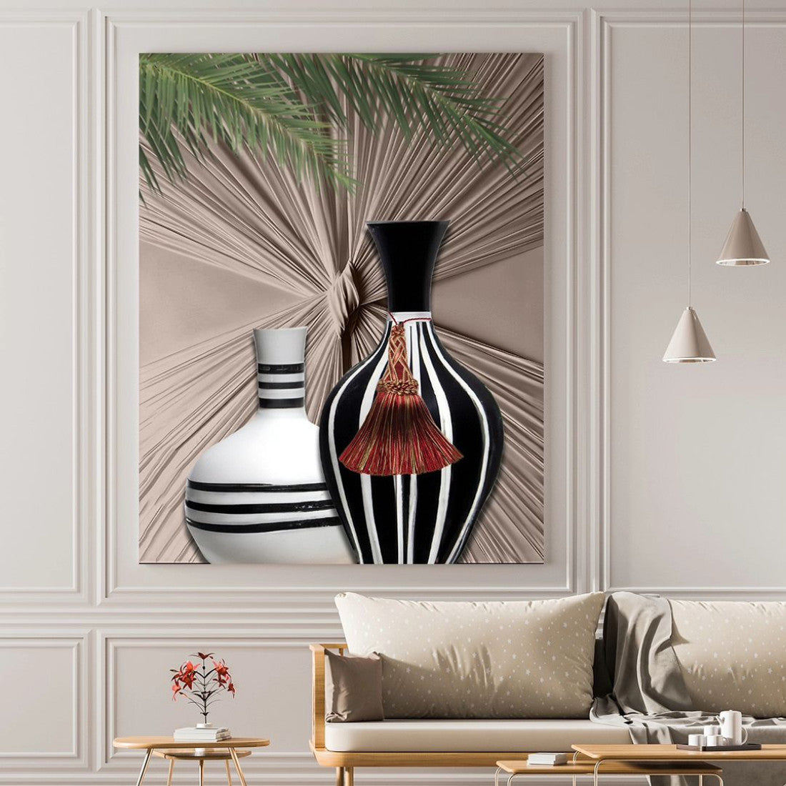 مزهرية عصرية مزينة بلوحة قماشية وأغصان خضراء